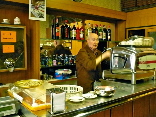 Old Barista in Milano working with his Faema E61 