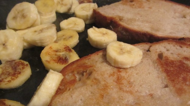 butter roasted bread with nutella and banana - brown the bread and heat the banana