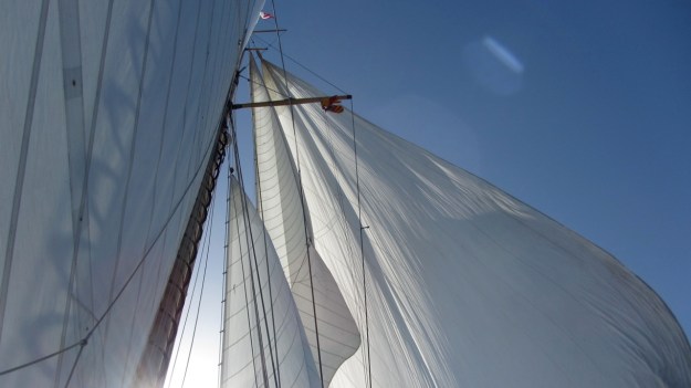 Moonbeam IV Yacht sails with sun