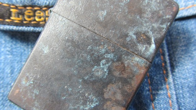 Brass zippo lighter rapidly vintaged by feinschmuck - closed macro surface