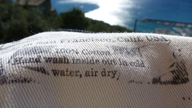 Tellason Ankara Jeans hand printed instructions on the pockets