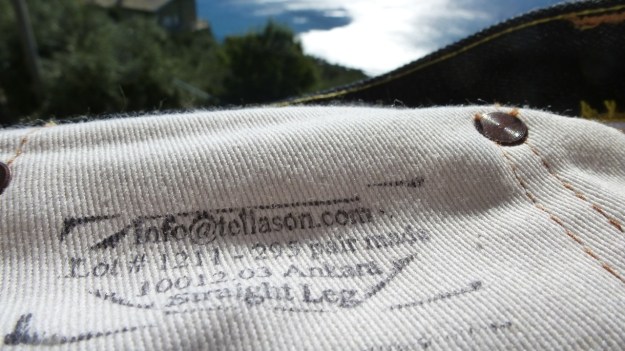 Tellason Ankara Jeans hand printed instructions on the pockets