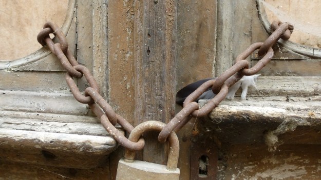old doors in italy chain locked