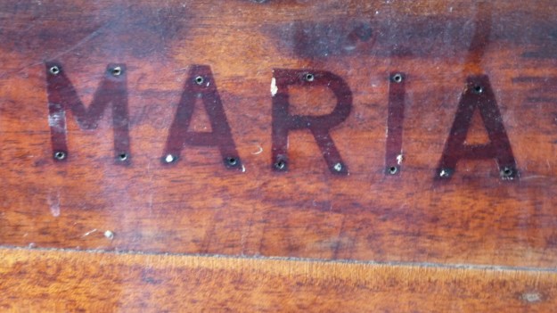 old stuff around the shipyard - maria mahogany print on vintage boat