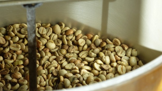 Homeroasted coffee and fresh bread - green coffee beans before the roasting