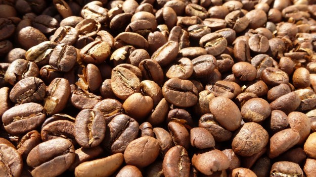 Homeroasted coffee and fresh bread - roasted beans for espresso