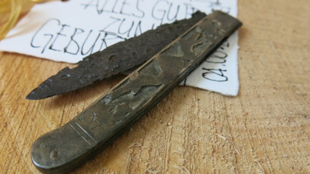 archeological pocket knife pigeons and heart 1