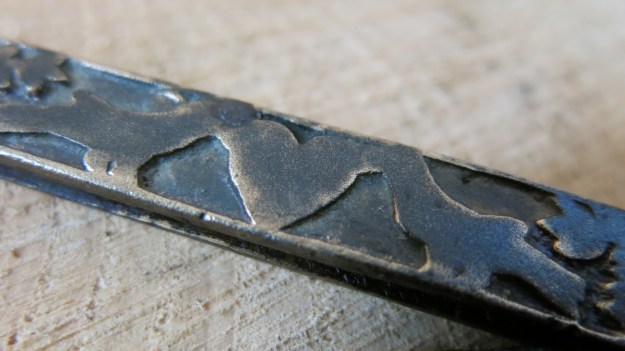 archeological pocket knife pigeons and heart 2